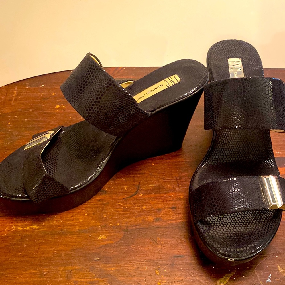 Black slip on platform alligator patent leather sandals. Size 8.